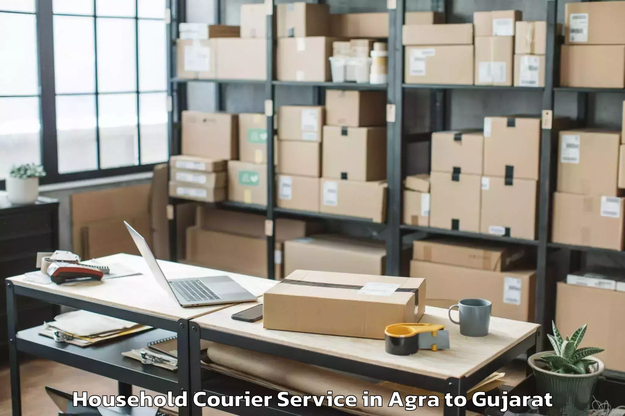 Book Your Agra to Hansot Household Courier Today